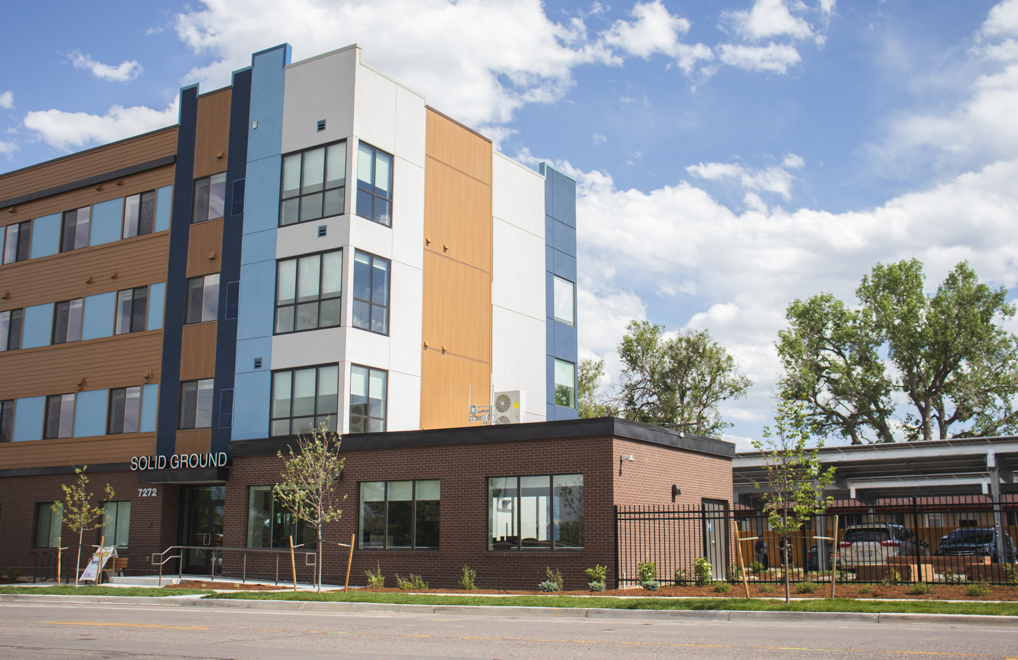An exterior view of the Solid Ground Apartments building.