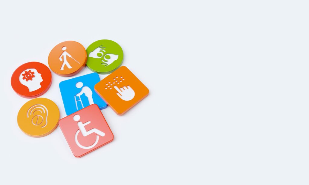 Een cluster van kleurrijke 3D-iconen die verschillende beperkingen vertegenwoordigen, is links op een witte achtergrond verzameld. De iconen omvatten een persoon in een rolstoel, een oudere met een rollator, een figuur met een stok, een oor (gehoorverlies), handen (gebarentaal), een hoofd met een tandwiel (cognitieve beperking) en een hand met stippen (braille).
